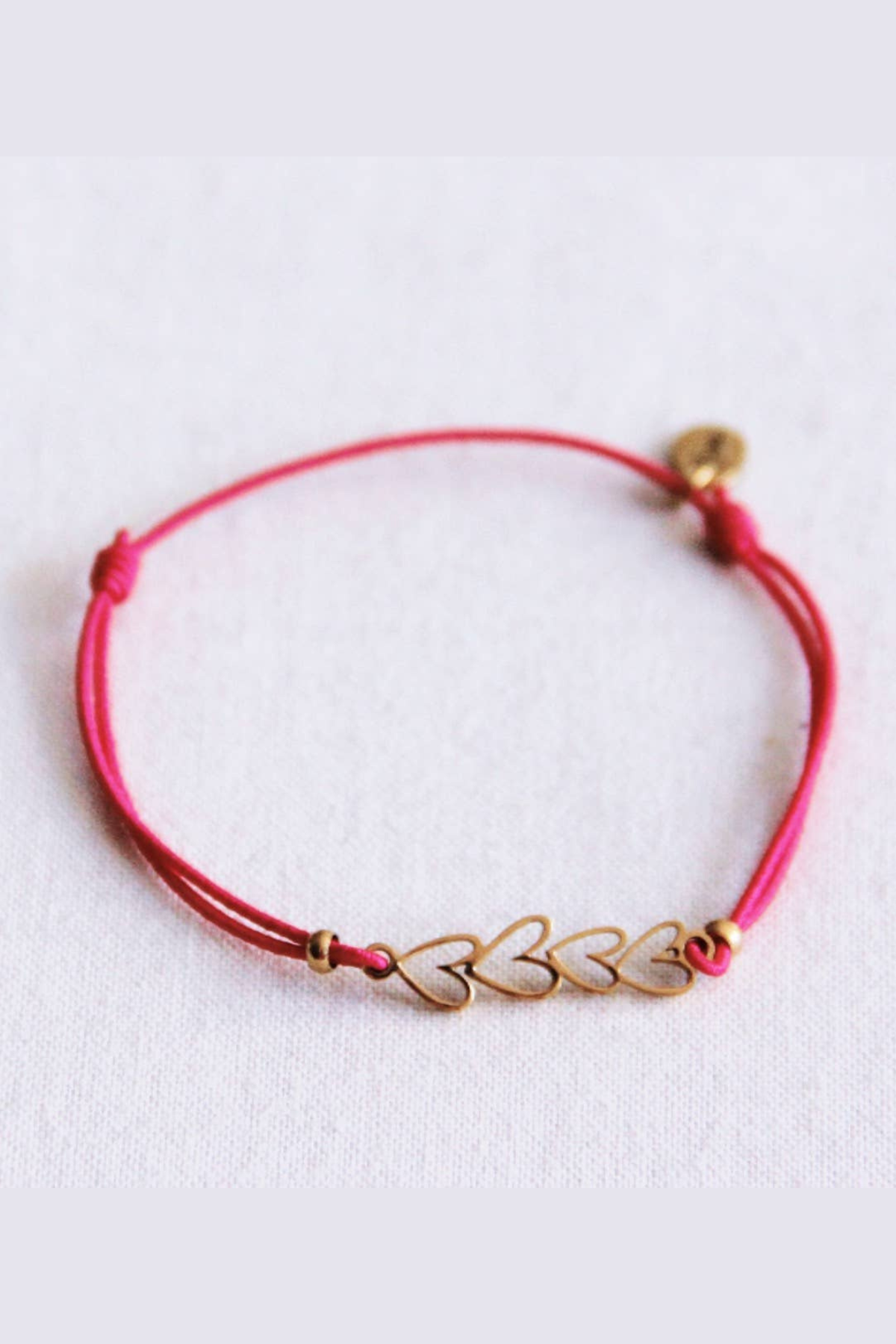 Gold Hearts Bracelet Fuchsia