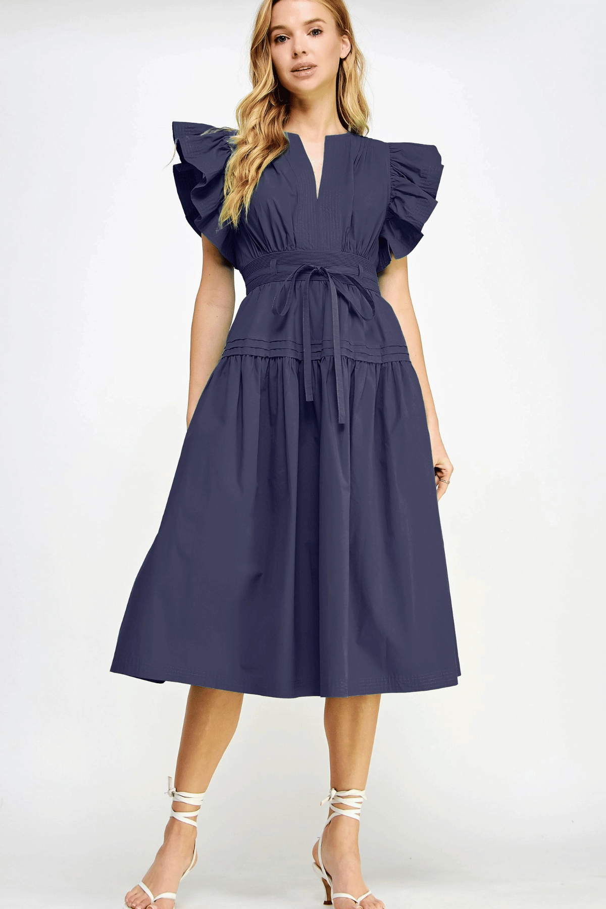 The Adeline cotton poplin midi dress in navy with flutter sleeves