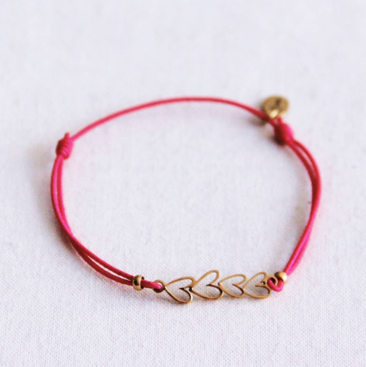 Gold Hearts Bracelet Fuchsia
