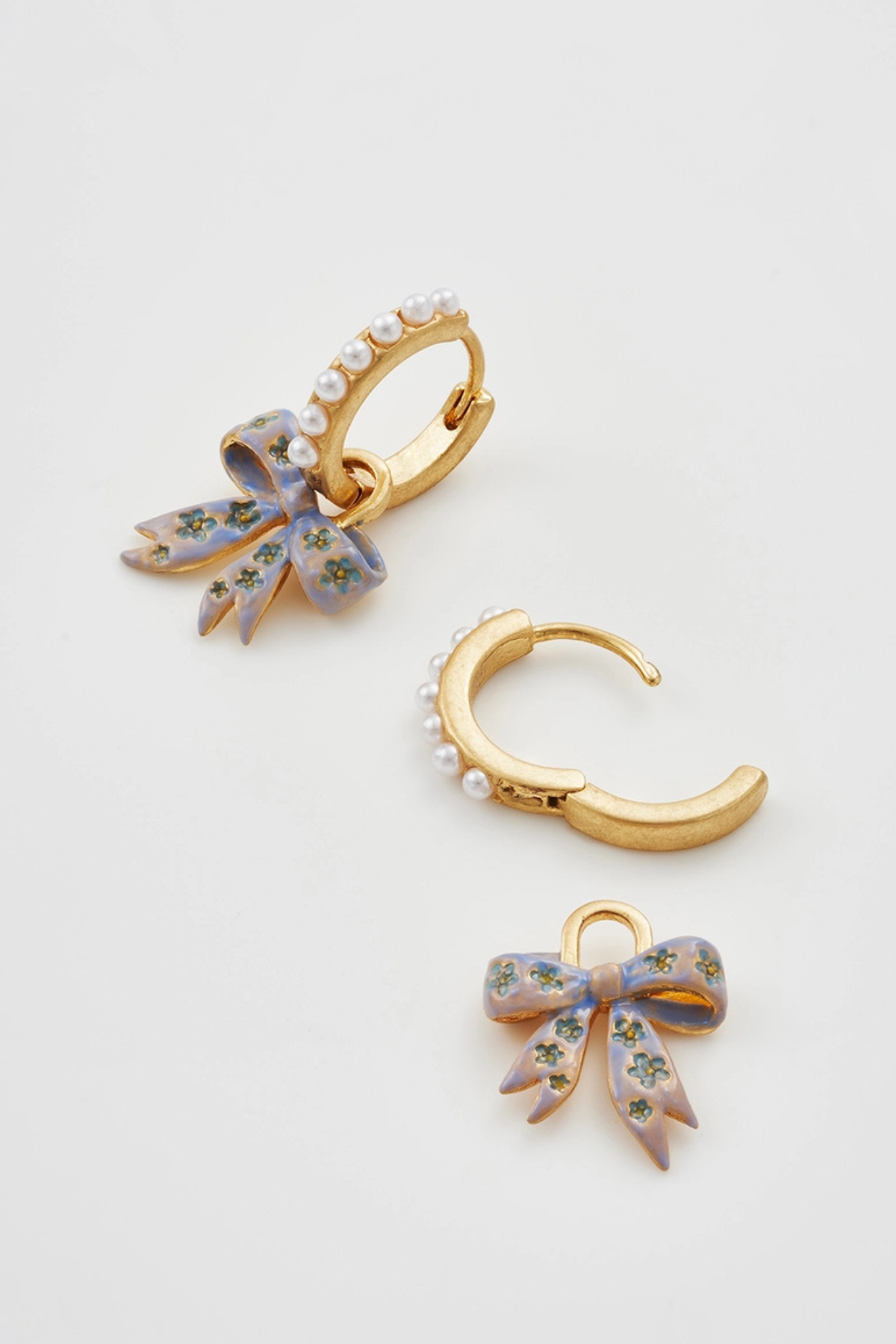 Bow Pearl Huggie Earrings